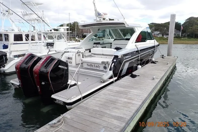  Yacht Photos Pics 2022 Formula 380 Super Sport Crossover OB docked with twin Mercury outboards.