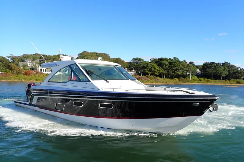  Yacht Photos Pics 2022 Formula 380 Super Sport Crossover OB cruising on a sunny day.