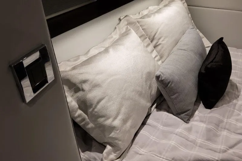  Yacht Photos Pics Luxurious bedding in 2022 Formula 380 Super Sport Crossover OB cabin interior.