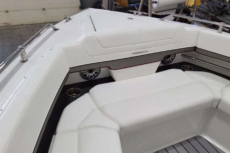 Yacht Photos Pics 2022 Formula 380 Super Sport Crossover OB interior with white seating and cup holders.
