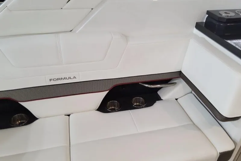  Yacht Photos Pics 2022 Formula 380 Super Sport Crossover OB interior with white leather seating and cup holders.