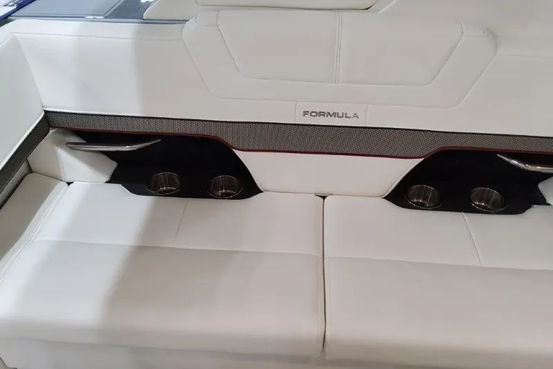  Yacht Photos Pics 2022 Formula 380 Super Sport Crossover OB interior with white leather seating and cup holders.