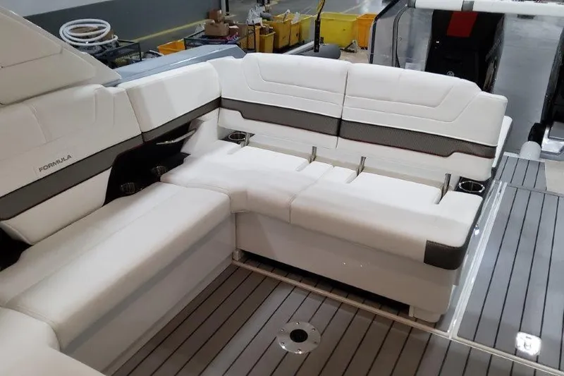  Yacht Photos Pics 2022 Formula 380 Super Sport Crossover OB interior with white seating and modern design.