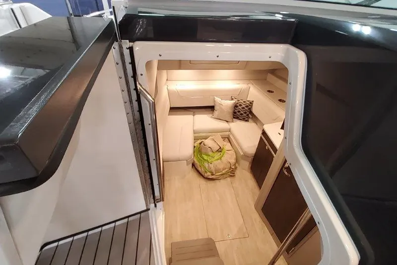  Yacht Photos Pics Interior view of 2022 Formula 380 Super Sport Crossover OB, featuring cozy seating area.