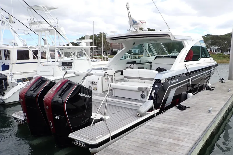  Yacht Photos Pics 2022 Formula 380 Super Sport Crossover OB docked with twin Mercury outboard engines.
