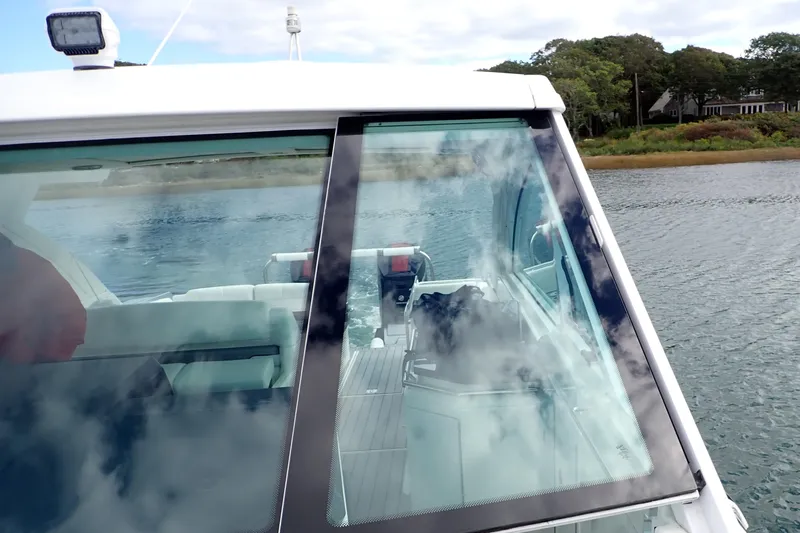  Yacht Photos Pics 2022 Formula 380 Super Sport Crossover OB on water, showcasing sleek design and spacious interior.