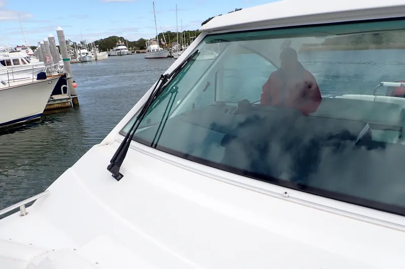  Yacht Photos Pics 2022 Formula 380 Super Sport Crossover OB docked at marina, viewed through windshield.