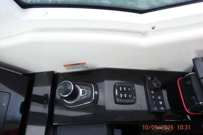  Yacht Photos Pics Control panel of 2022 Formula 380 Super Sport Crossover OB boat cockpit.