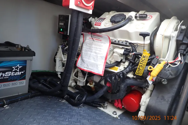  Yacht Photos Pics Engine compartment of a 2022 Formula 380 Super Sport Crossover OB with battery and dipstick.