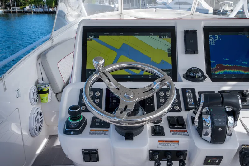 Patti Anne Yacht Photos Pics Helm of 2022 Intrepid 409 Valor boat with advanced navigation displays and controls.