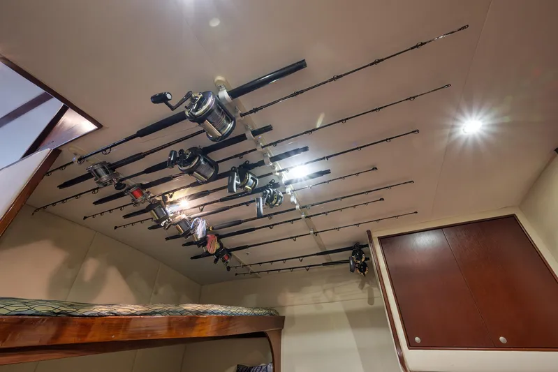 Decoy Yacht Photos Pics Fishing rods stored on ceiling of 2002 Paul Mann 60 Custom Carolina boat cabin.