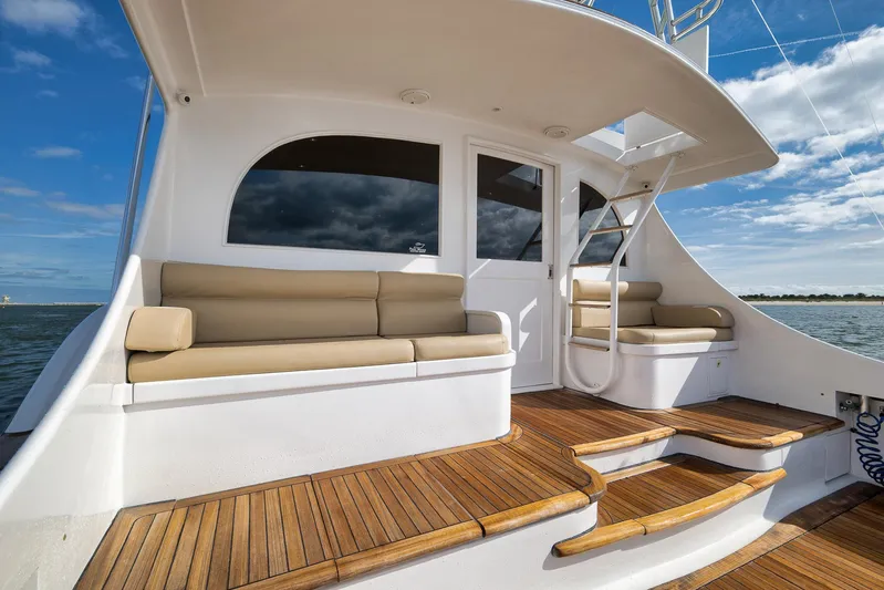 Decoy Yacht Photos Pics Luxurious 2002 Paul Mann 60 Custom Carolina yacht with elegant seating and wooden deck.