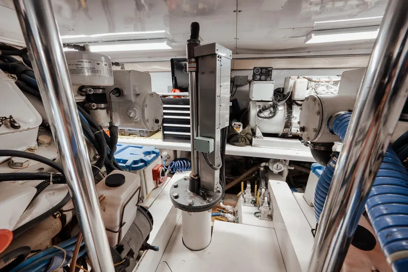 Decoy Yacht Photos Pics Engine room of 2002 Paul Mann 60 Custom Carolina yacht, showcasing mechanical components and equipment.