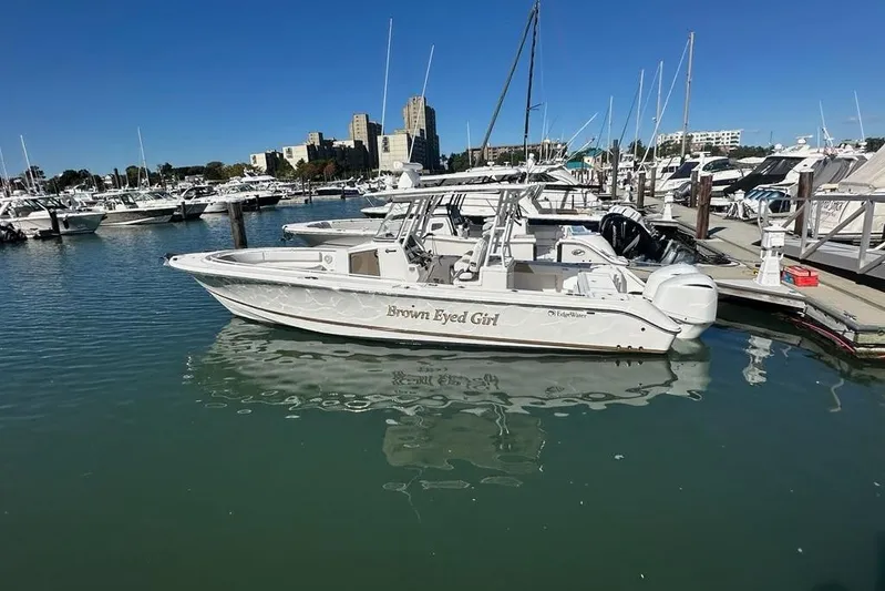  Yacht Photos Pics 2015 Edgewater 320CC boat named "Brown Eyed Girl" docked in a marina.