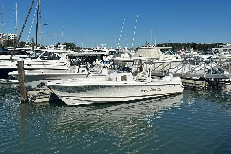  Yacht Photos Pics 2015 Edgewater 320CC boat named "Brown Eyed Girl" docked in a marina.