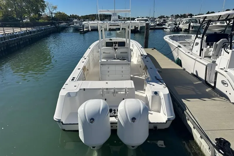  Yacht Photos Pics 2015 Edgewater 320CC boat docked at marina with twin engines.