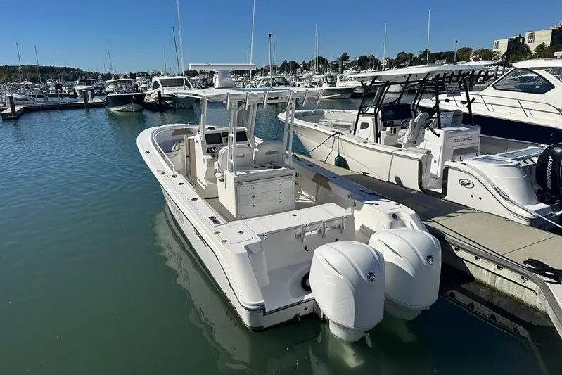  Yacht Photos Pics 2015 Edgewater 320CC boat docked at marina with twin engines.