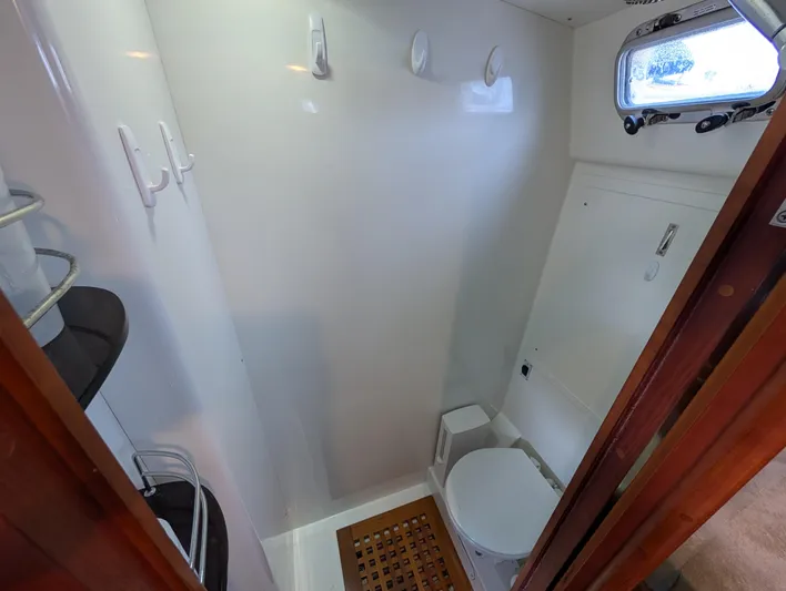 Ubiquitous Yacht Photos Pics Compact bathroom in 2015 Outbound 46 yacht with toilet and porthole.