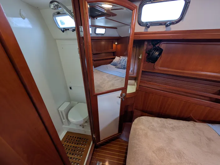 Ubiquitous Yacht Photos Pics Luxurious 2015 Outbound 46 yacht interior with cozy bedroom and compact bathroom.