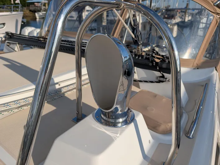 Ubiquitous Yacht Photos Pics Chrome detail on 2015 Outbound 46 yacht deck, featuring polished metal and nautical elements.