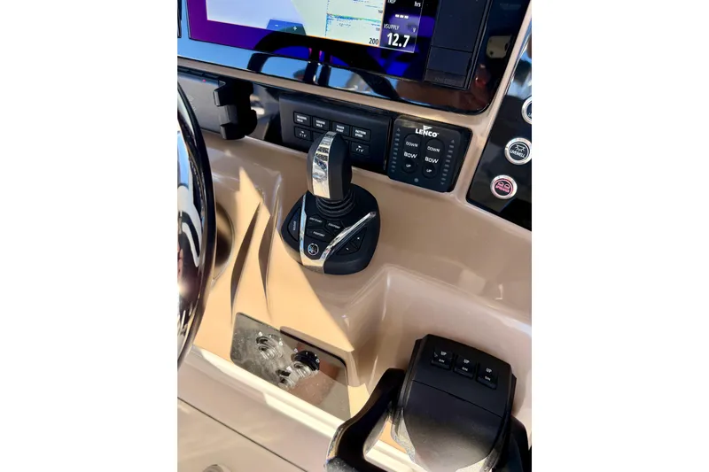Da Kine Yacht Photos Pics 2022 Robalo R272 Center Console dashboard with controls and navigation display.