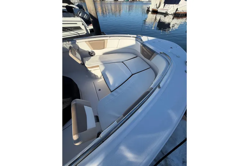 Da Kine Yacht Photos Pics 2022 Robalo R272 Center Console boat with spacious seating at the dock.