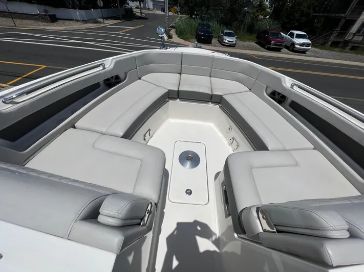  Yacht Photos Pics 2022 Sea Ray SLX 310 boat with spacious seating and sleek design.