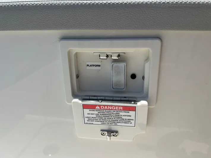  Yacht Photos Pics Control panel on a 2022 Sea Ray SLX 310 boat with safety warning.