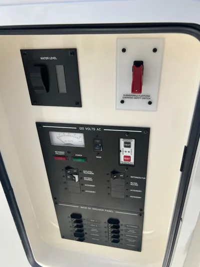  Yacht Photos Pics Electrical control panel on a 2022 Sea Ray SLX 310 boat.