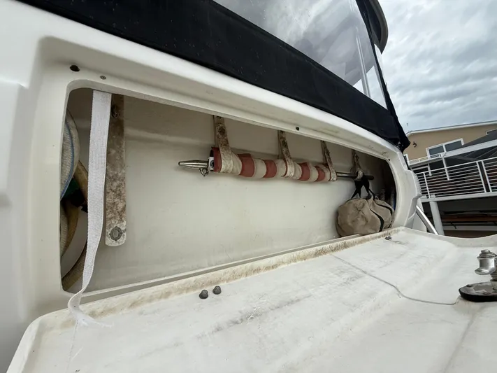  Yacht Photos Pics 2006 Sea Ray 40 Motor Yacht storage compartment with equipment and accessories.