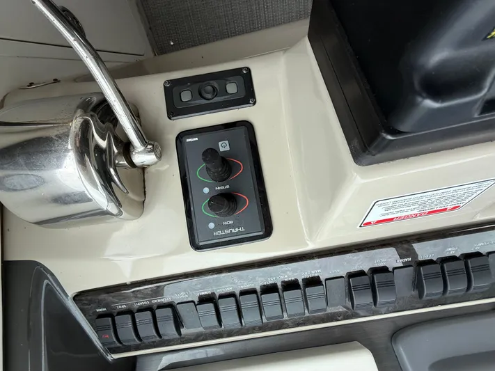  Yacht Photos Pics Control panel of a 2006 Sea Ray 40 Motor Yacht with joystick and switches.