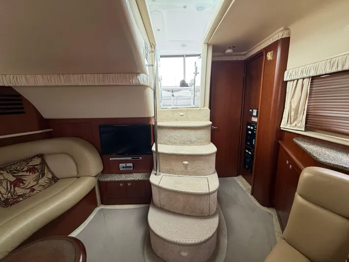  Yacht Photos Pics Interior of 2006 Sea Ray 40 Motor Yacht with plush seating and elegant staircase.