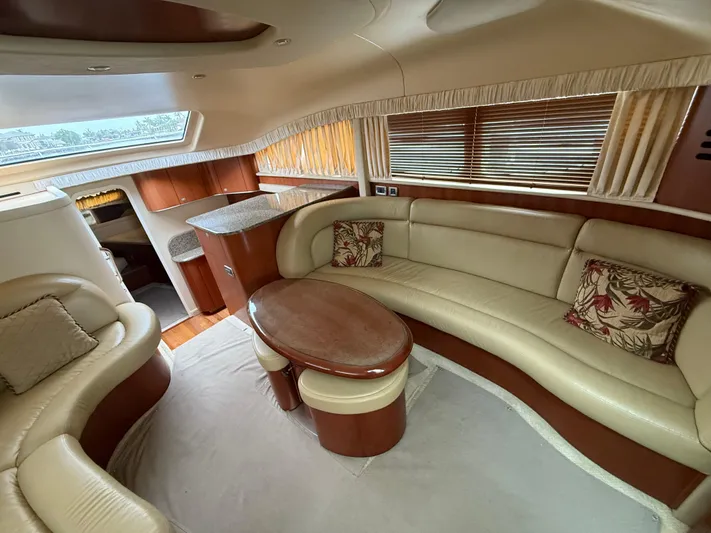  Yacht Photos Pics Luxurious interior of a 2006 Sea Ray 40 Motor Yacht with elegant seating and wooden accents.