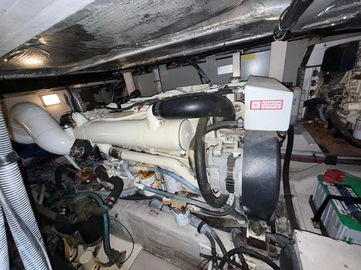  Yacht Photos Pics Engine room of 2006 Sea Ray 40 Motor Yacht, showcasing mechanical components and wiring.