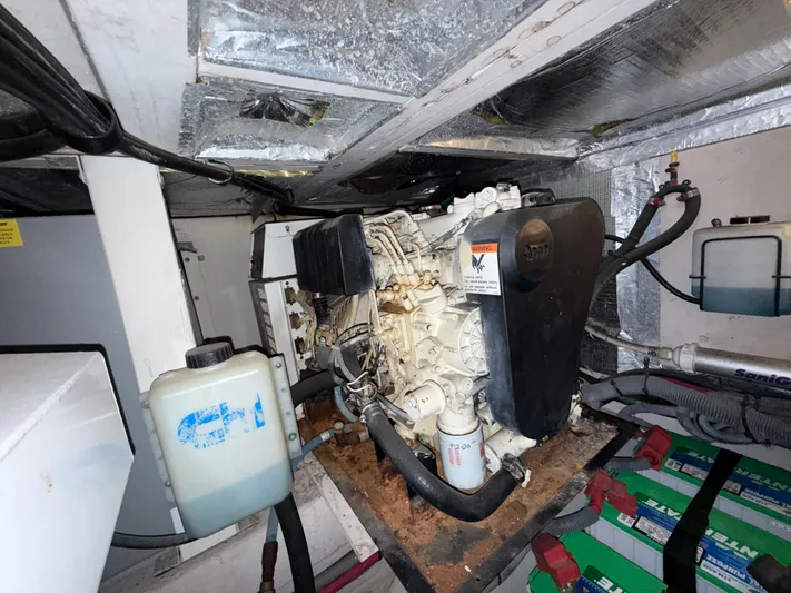  Yacht Photos Pics Engine room of a 2006 Sea Ray 40 Motor Yacht, showcasing mechanical components.