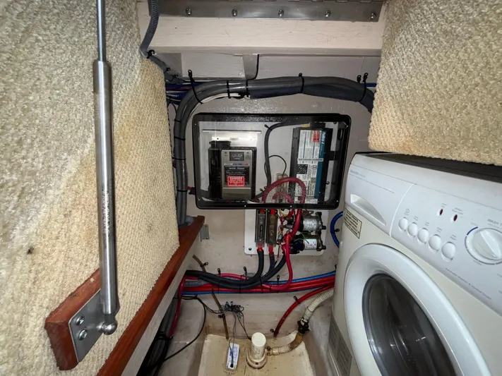  Yacht Photos Pics Electrical panel and washer in 2006 Sea Ray 40 Motor Yacht interior.
