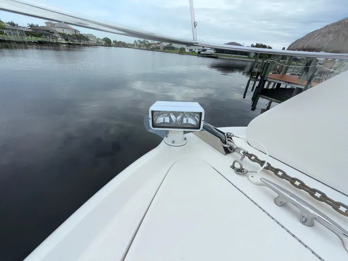  Yacht Photos Pics Bow of 2006 Sea Ray 40 Motor Yacht with anchor chain and spotlight.