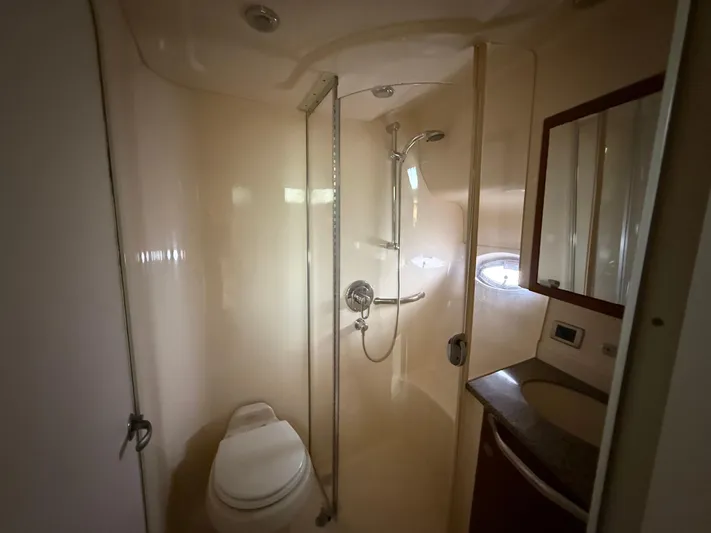 Yacht Photos Pics Bathroom interior of 2006 Sea Ray 40 Motor Yacht with shower and toilet.