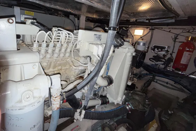  Yacht Photos Pics Engine room of a 2006 Sea Ray 40 Motor Yacht, showcasing mechanical components and systems.