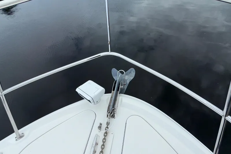  Yacht Photos Pics Bow of 2006 Sea Ray 40 Motor Yacht with anchor and calm water view.