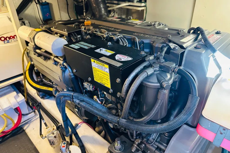 No Rush Yacht Photos Pics Engine room of 2006 Sabre 42 Fly Bridge with detailed mechanical components.