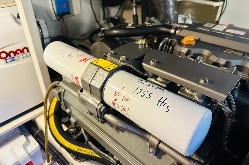 No Rush Yacht Photos Pics Engine room of 2006 Sabre 42 Fly Bridge with Onan generator and filter details.