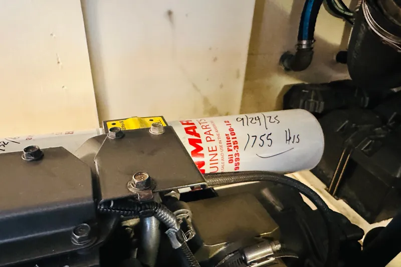 No Rush Yacht Photos Pics Engine compartment of 2006 Sabre 42 Fly Bridge with Yanmar oil filter.