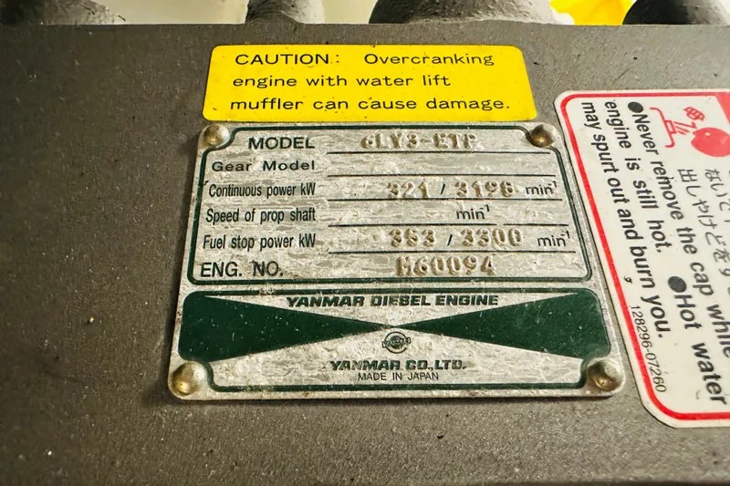 No Rush Yacht Photos Pics Yanmar diesel engine plate with caution labels on Sabre 42 Fly Bridge, 2006 model.