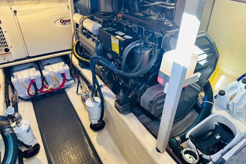 No Rush Yacht Photos Pics Engine room of 2006 Sabre 42 Fly Bridge with Onan generator and dual batteries.