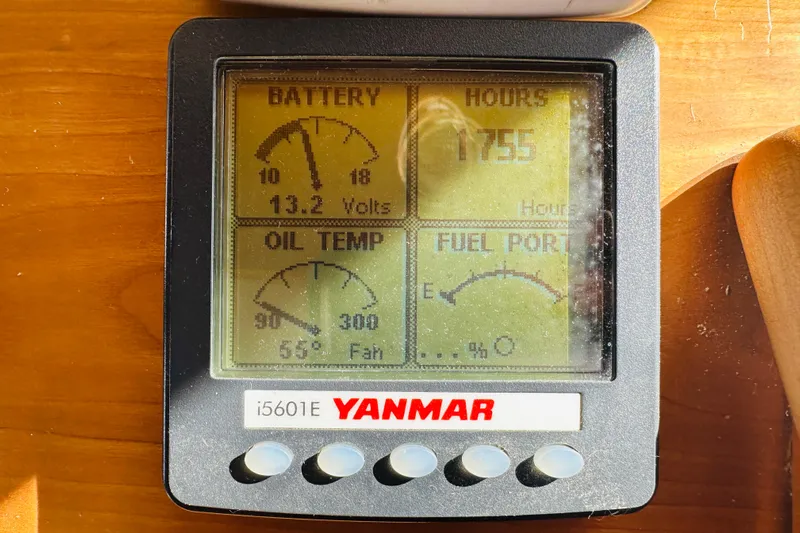 No Rush Yacht Photos Pics Yanmar i5601E display showing battery voltage, engine hours, oil temperature, and fuel level.