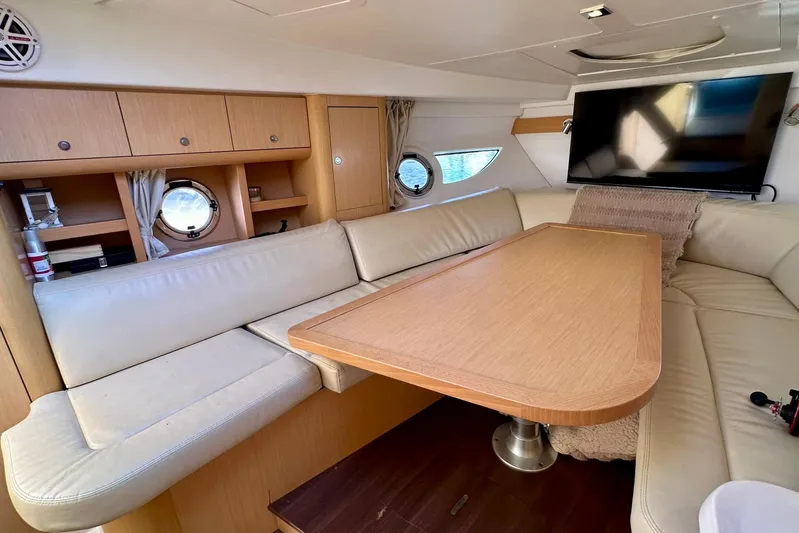  Yacht Photos Pics Interior of 2012 Beneteau Gran Turismo 34 yacht with cozy seating and modern amenities.