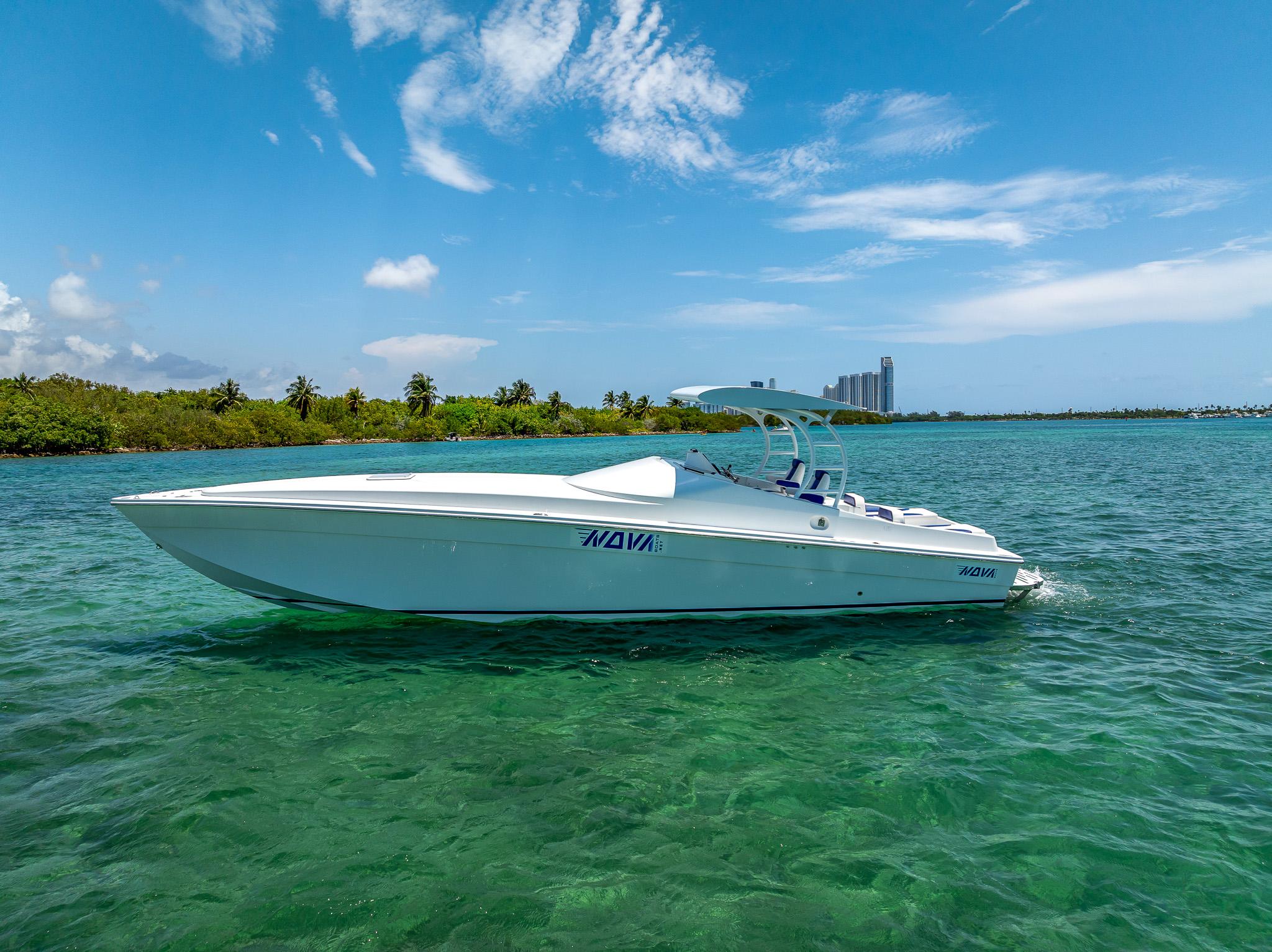 2020 Nova 39 Sport boat on clear water under blue sky.