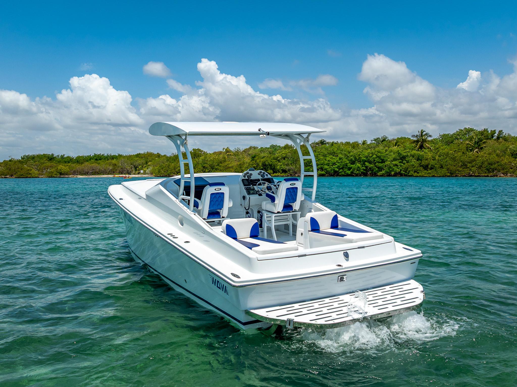Nova 39 Sport 2020 boat cruising on clear blue water under a sunny sky.