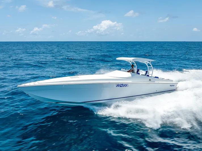  Yacht Photos Pics Nova 39 Sport 2020 speedboat cruising on open ocean under clear blue sky.